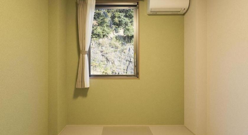 Daemado Hotel Hitakatsu Kamitsushima Buitenkant foto